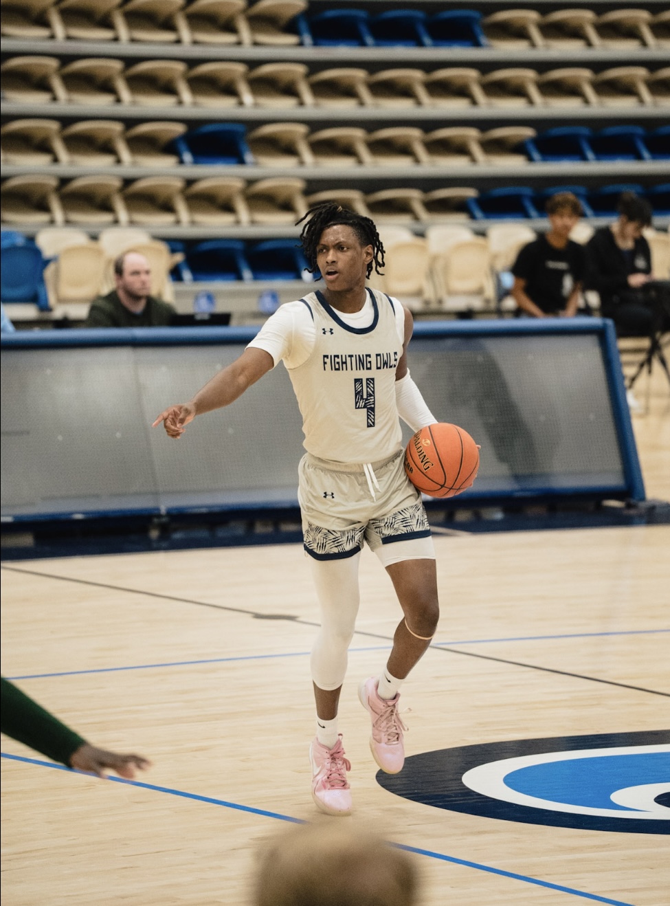 Carl Powell III playing basketball